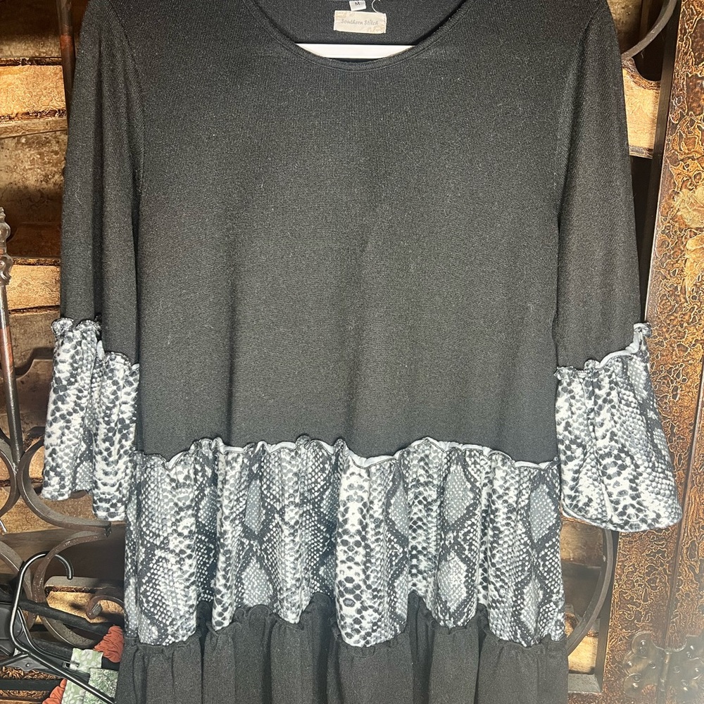 Southern Stitch boutique dress. Black Dress with Snake Print Ruffle.